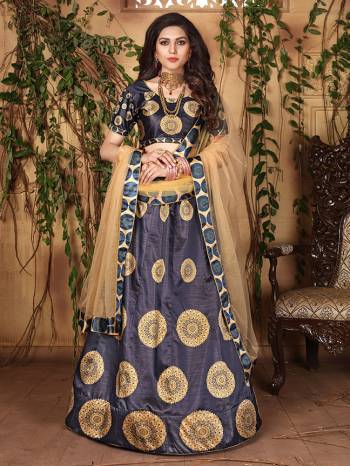 This Festive Season, Look The Most Unique And Prettiest Of All Wearing This Designer Lehenga Choli Fabricated On Jari Satin Beautified With Attractive Digital Prints Paired With Net Fabricated Dupatta Beautified With Stone Work. 