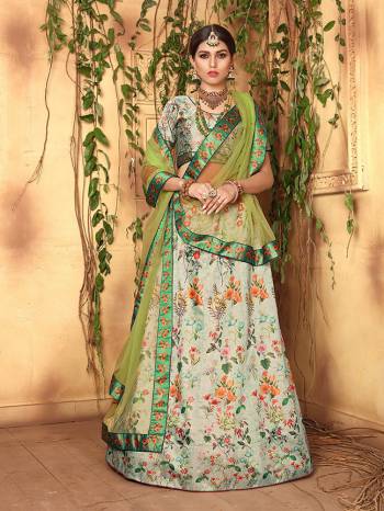 Grab This Designer Colorful Lehenga Choli Fabricated On Jari Satin Paired With Net Fabricated Dupatta. Its Blouse And Lehenga Are Beautified With Digital Prints And Dupatta With Stone Work. Buy This Designer Piece Now. 