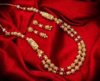 New And Unique Patterned Designer Necklace Set Is Here In Golden Color With Double Layer. It Is Beautified With Pearl Work And Also Light In Weight And Can Be Paired With Any Colored Ethnic Attire.