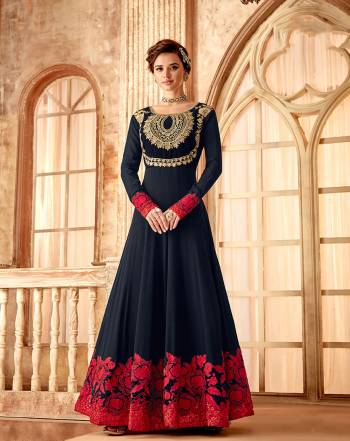 Enhance Your Beauty Wearing This Designer Floor Length Suit In Navy Blue Color Fabricated On Georgette Beautified With Heavy Attractive Embroidery Paired With Santoon Bottom And Chiffon Fabricated Dupatta.  Buy This Suit Now.