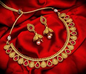 Grab This Heavy Necklace Set For The Upcoming Wedding Season. Pair This Up With Your Heavy Ethnic Attire And As It Is In Golden Color, It Can Be Paired With Any Colored Attire. Buy Now