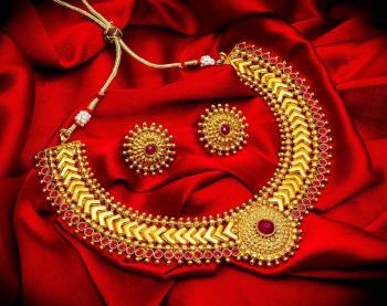 Grab This Heavy Necklace Set For The Upcoming Wedding Season. Pair This Up With Your Heavy Ethnic Attire And As It Is In Golden Color, It Can Be Paired With Any Colored Attire. Buy Now