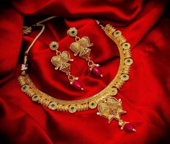 Grab This Heavy Necklace Set For The Upcoming Wedding Season. Pair This Up With Your Heavy Ethnic Attire And As It Is In Golden Color, It Can Be Paired With Any Colored Attire. Buy Now