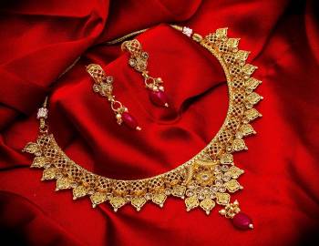 Grab This Heavy Necklace Set For The Upcoming Wedding Season. Pair This Up With Your Heavy Ethnic Attire And As It Is In Golden Color, It Can Be Paired With Any Colored Attire. Buy Now