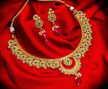 Grab This Heavy Necklace Set For The Upcoming Wedding Season. Pair This Up With Your Heavy Ethnic Attire And As It Is In Golden Color, It Can Be Paired With Any Colored Attire. Buy Now