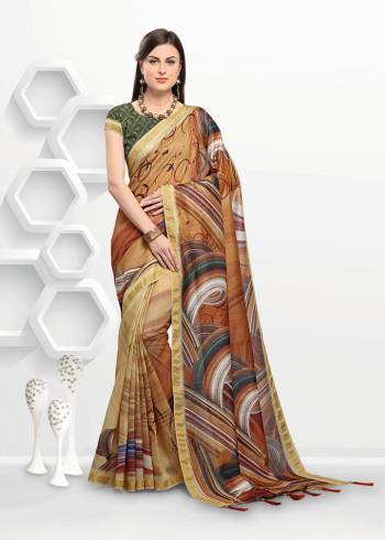 For Your Semi-Casuals Or Festive Wear. Grab This Pretty Light Weight Printed Saree Fabricated On Linen. It Is Beautified With Prints All Over And Its Fabric Is Light Weight, Durable And Easy To Care For. 