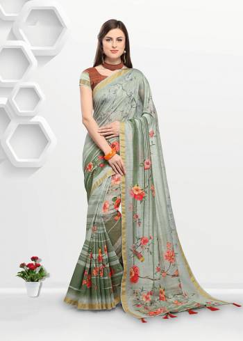 For Your Semi-Casuals Or Festive Wear. Grab This Pretty Light Weight Printed Saree Fabricated On Linen. It Is Beautified With Prints All Over And Its Fabric Is Light Weight, Durable And Easy To Care For. 