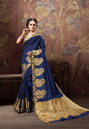 Here Is A Rich And Elegant Looking Designer Silk Based Saree In Navy Blue Color. This Saree And Blouse Are Fabricated On Cotton Silk Beautified With Bold Motif Weave Over The Border. Also It Is Durable, Light Weight And Easy To Carry All Day Long. 