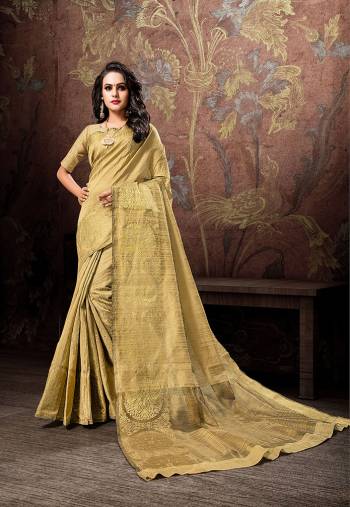 Simple And Elegant Looking Silk Based Saree Is Here In Golden Color Which Is Suitable For All Occasion Wear. This Saree And Blouse Are Fabricated On Cotton Silk Beautified With Weave. You Can Pair This Up With Pearl Accessories For An Enhanced Look. 