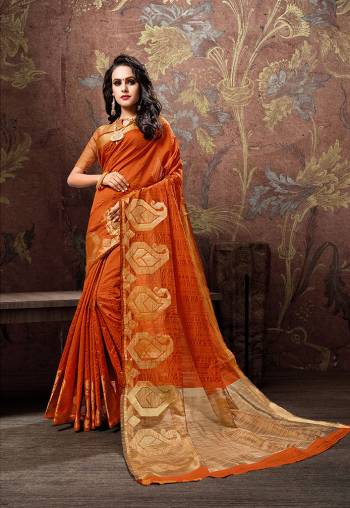 Celebrate this Festive Season Wearing This Designer Silk Based Saree In Bright Orange Color. This Saree And Blouse Are Fabricated on Cotton Silk. It Is Light Weight And Easy To Drape Which Lets You Enjoy The Festive Feel To The Fullest. 