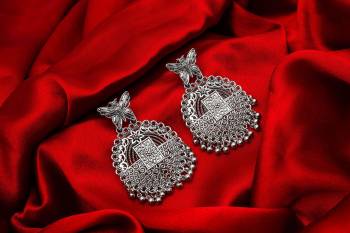 Buy This Pretty Pair Of Earrings In Silver Color Which Can Be Paired With Colored Attire. These Earrings Will Give A Pretty Elegant Look Which Will eanr You Lots Of Compliments From Onlookers