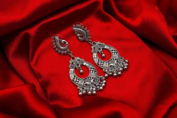 Buy This Pretty Pair Of Earrings In Silver Color Which Can Be Paired With Colored Attire. These Earrings Will Give A Pretty Elegant Look Which Will eanr You Lots Of Compliments From Onlookers