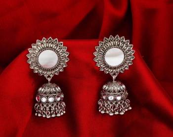 Buy This Pretty Pair Of Earrings In Silver Color Which Can Be Paired With Colored Attire. These Earrings Will Give A Pretty Elegant Look Which Will eanr You Lots Of Compliments From Onlookers