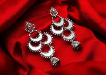 Buy This Pretty Pair Of Earrings In Silver Color Which Can Be Paired With Colored Attire. These Earrings Will Give A Pretty Elegant Look Which Will eanr You Lots Of Compliments From Onlookers