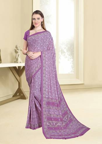 Add Some Casuals With This Pretty Printed Saree In Light Purple Color Paired With Light Purple Colored Blouse. This Saree And Blouse Are Fabricated On Crepe Beautified With Intricate Prints All Over It. 