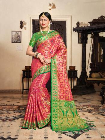 Shine Bright Wearing This Designer Silk Based Saree In Dark Pink Color Paired With Contrasting Green Colored Blouse. This Saree And Blouse Are Fabricated On Lichi Art Silk Beautified With Heavy Weave All Over. 