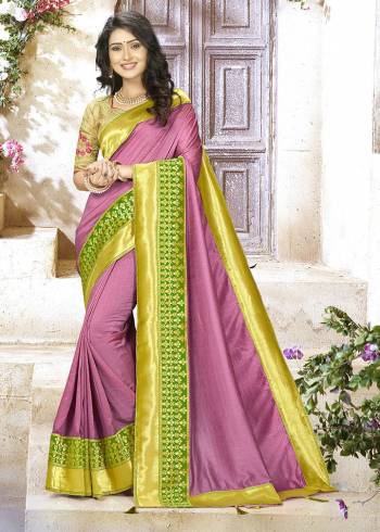 A Must Have Shade In Every Womens Wardrobe Is Here With This Designer Saree In Onion Pink Color Paired With Contrasting Light Green Colored Blouse. This Saree Is Fabricated On Chinon Silk Paired With Jacquard Silk Fabricated Blouse. 