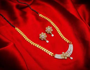 Grab This Very Pretty Mangalsutra Set With A Whole New Design And Pattern. This Pretty Set Can Be Paired With Any Colored Ethnic Attire. It Is Light Weight And Easy To Carry All Day Long. 