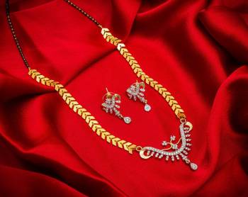 Grab This Very Pretty Mangalsutra Set With A Whole New Design And Pattern. This Pretty Set Can Be Paired With Any Colored Ethnic Attire. It Is Light Weight And Easy To Carry All Day Long. 