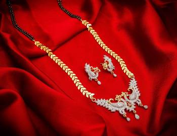 Grab This Very Pretty Mangalsutra Set With A Whole New Design And Pattern. This Pretty Set Can Be Paired With Any Colored Ethnic Attire. It Is Light Weight And Easy To Carry All Day Long. 