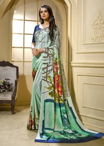 Add This Pretty Saree To Your Wardrobe For Your Casual Or Semi-Casual Wear. This Saree And Blouse Are Fabricated On Crepe Beautified With Abstract Prints All Over It. Buy Now