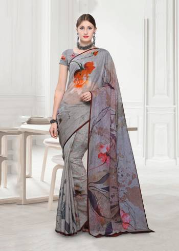 For A Rich And Elegant Look In Your Semi-Casuals, Grab this Beautiful Designer Saree Fabricated On Georgette. This Saree Is Beautified Abstract Floral Prints Which Gives A New, Unique And Trendy Look. Buy This Pretty Saree Now.