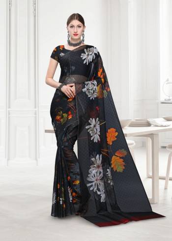 Your Will Definitely Earn Lots Of Compliments Wearing This Designer Printed Saree Fabricated On Georgette Paired With Georgette Fabricated Blouse. This Saree Is Beautified Abstract And Floral Prints. Buy This Pretty Light Weight Saree Now.