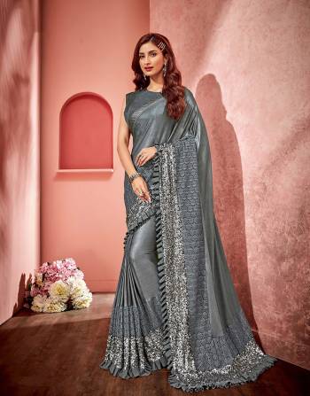 With a smattering of sequins and thrill of frills, the saree soars to a whole new level of glam. Opt for suble jewels to keep the look balanced.