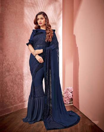 It?s a clash of style and sophistication as season's most covetable frills combine with the classic and timeless saree. Opt for an open falling pallu drape to make the most of the saree.