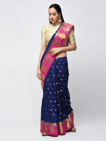 Grab This Beautiful Designer Silk Based Saree In Royal Blue Color Paired With Contrasting Cream Colored Blouse. This Saree Is Fabricated Jacquard Silk Paired With Art Silk Fabricated Blouse. 