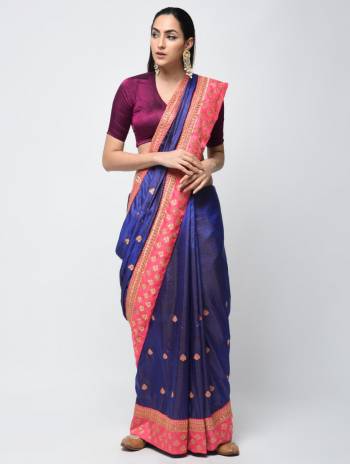 Bright And Visually Appealing Color Is Here With This Designer Saree In Royal Blue Color Paired With Contrasting Wine Colored Blouse. This Saree And Blouse Are Fabricated On Art Silk Beautified With Embroidered Butti And Lace Border. 