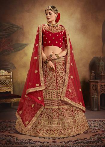 Get Ready For Your D-Day With This Heavy Designer Lehenga Choli In All Over Red Color. This Heavy Embroidered Lehenga Choli Is Fabricated On Velvet Paired With Net Fabricated Dupatta. It Is Beautified With Heavy Coding Jari Embroidery And Stone Work. Buy This Bridal Lehenga Now.