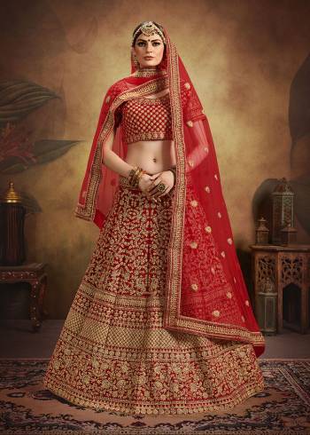 If You Want To Become The Most Attractive And Elegant Bride, Than Grab This Heavy Designer Lehenga Choli In All Over Red Color. Its Heavy Embroidered Lehenga And Choli Are Fabricated On Velvet Paired With Net Fabricated Dupatta. It Beautiful Rich Color And Clean Embroidery Will Earn You lots Of Compliments From Onlookers. 