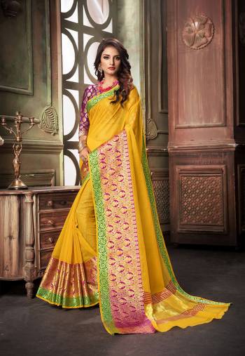 Here Is A Very Pretty Designer Saree For The Upcoming Festive And?Wedding Season. Grab This Pretty Saree In Yellow Color Paired With Contrasting Purple Colored Blouse. This Saree Is Fabricated On Cotton Silk Paired With Art Silk Fabricated Blouse. Buy This Saree Now