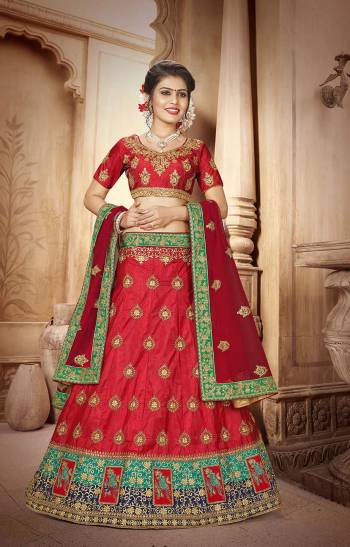 Adorn The Pretty Angelic Look Wearing This Designer Lehenga Choli In Red Color Paired With Maroon Colored Dupatta, This Lehenga Choli Is Fabricated On Art Silk Paired With Net Fabricated Dupatta. 