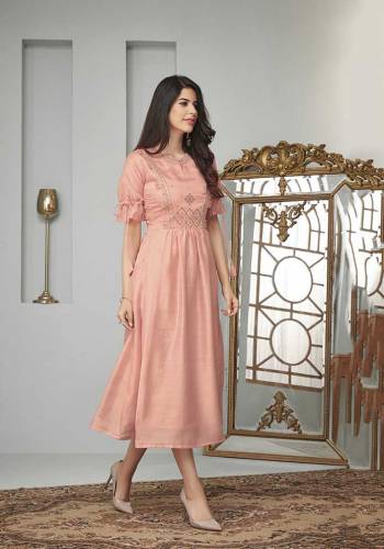 Look Pretty And Earn Lots Of Compliments Wearing This Readymade Designer Kurti In Peach Color Fabricated On Cotton Slub. It Is Beautified With Contrasting Thread Work Over The Yoke. Also It Is Available In All Regular Sizes. 