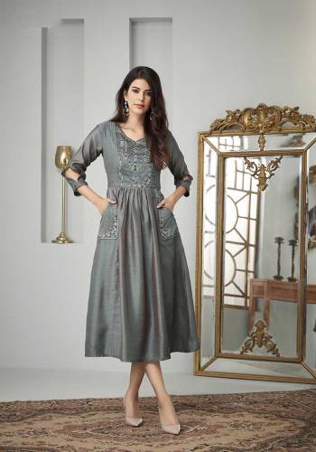 Add This Beautiful Designer Readymade Kurti To Your Wardrobe In Dark Grey Color Fabricated On Cotton Slub. This Kurti Is Beautified With Thread Work And Available In All Regular Sizes. 