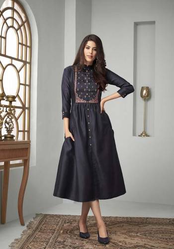 Enhance Your Personality Wearing This Designer Readymade Kurti In Navy Blue Color Fabricated On Cotton Slub. It Is Beautified With Contrasting Thread Work Over The Yoke And Available In All Regular Sizes.