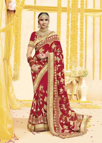 Here Is Beautiful Collection In Bridal Sarees With This Designer Saree In Red Color Paired With Red Colored Blouse. This Saree And Blouse are fabricated On Georgette Beautified With Heavy Jari Embroidery And Stone Work. This Beautiful Heavy Saree Will A Proper Bridal Look And Will Earn You Lots Of Compliments From Onlookers.
