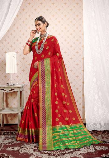 Adorn the Pretty Angelic Look In This Designer Silk Based Saree In Red Color Paired With Contrasting Green Colored Blouse. This Saree And Blouse Are Fabricated On Cotton Silk Beautified With Weave Giving The Saree An Attractive Look.