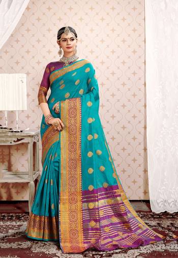 Adorn the Pretty Angelic Look In This Designer Silk Based Saree In Sky blue Color Paired With Purple Colored Blouse. This Saree And Blouse Are Fabricated On Cotton Silk Beautified With Weave Giving The Saree An Attractive Look.