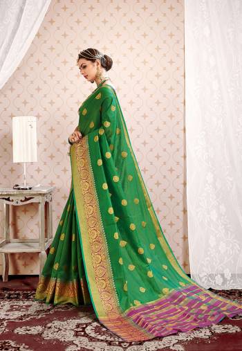 Look Pretty In This Simple And Elegant Looking Designer Saree In Green Color Paired With Purple Colored Blouse. This Saree And Blouse are Fabricated On Cotton Silk Beautified With Weave Over Lace Border.