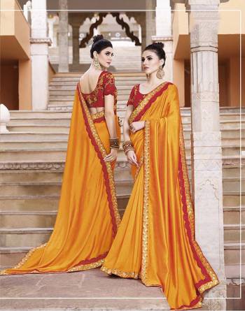 Catch All The Limelight At The Function You Attend Wearing This Designer Saree In Musturd Yellow Color Paired With Contrasting Red Colored Blouse. This Saree IS Fabricated on Vichitra Silk Paired With Art Silk Fabricated Blouse. 