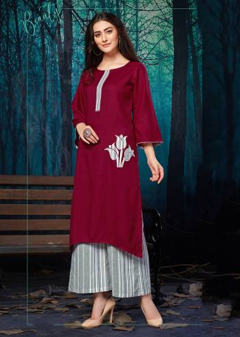 Simple and elegant Looking Readymade Plazzo Set Is Here In Maroon Colored Kurti Paired With Grey Colored Lining Plazzo. Its Top IS Fabricated on Rayon Beautified With Applique Work Paired With Khadi Cotton Fabricated Plazzo. 