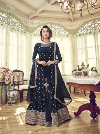 Enhance Your Personality Wearing This Designer Indo-Western Suit In Navy Blue Color. Its Designer Embroidred Top Is Georgette Fabricated Paired With Santoon Bottom And Georgette Fabricated Dupatta. 