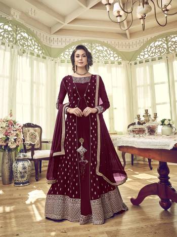 Enhance Your Personality Wearing This Designer Indo-Western Suit In Maroon Color. Its Designer Embroidred Top Is Georgette Fabricated Paired With Santoon Bottom And Georgette Fabricated Dupatta. 