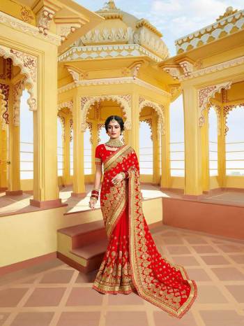 Celebrate This Festive Season With Beauty And Comfort Wearing This Attractive Looking Saree In Red Color Paired With Red Colored Blouse. This Heavy Embroidered Saree Is Fabricated On Georgette Paired With Art Silk Fabricated Blouse. Buy This Saree Now.