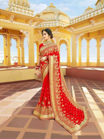 Celebrate This Festive Season With Beauty And Comfort Wearing This Attractive Looking Saree In Red Color Paired With Red Colored Blouse. This Heavy Embroidered Saree Is Fabricated On Georgette Paired With Art Silk Fabricated Blouse. Buy This Saree Now.