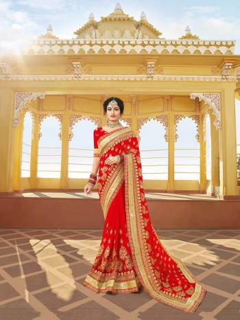 Look Attractively Beautiful In This Heavy Designer Saree In Red. This Saree Is Georgette Based Beautified With Heavy Embroidery. This Pretty Saree Is Durable And Easy To Carry Throughout The Gala.