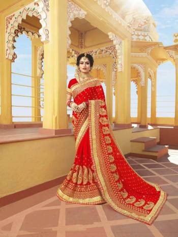 Celebrate This Festive Season With Beauty And Comfort Wearing This Attractive Looking Saree In Red Color Paired With Red Colored Blouse. This Heavy Embroidered Saree Is Fabricated On Georgette Paired With Art Silk Fabricated Blouse. Buy This Saree Now.